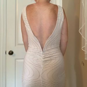 White Body Con Dress with Low Back!